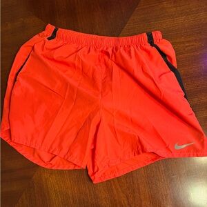 Men’s Nike Running Shorts
Size: Large
Red